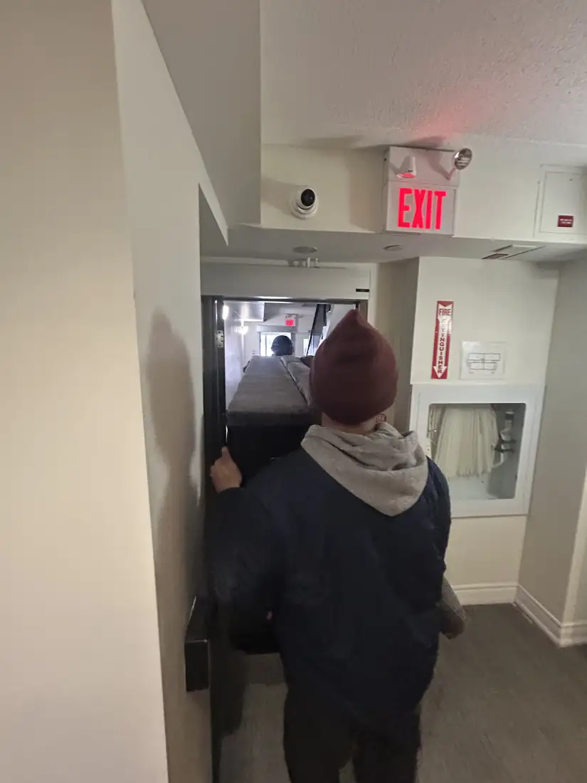 Moving a load out through the hallway